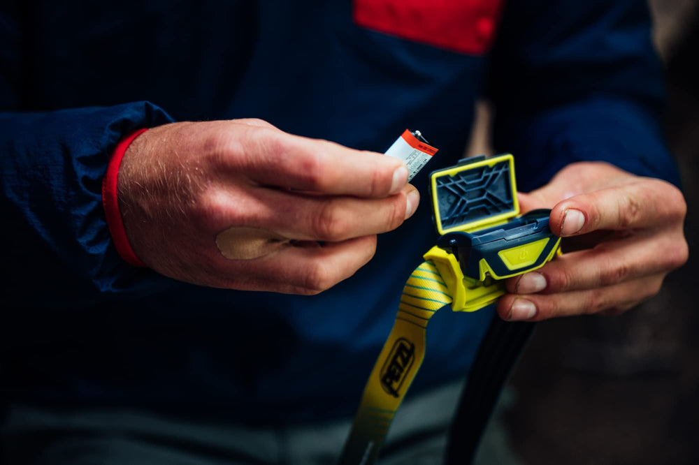 Petzl TIKKA CORE battery options highlight core rechargeable battery and AAA compatibility for camping
