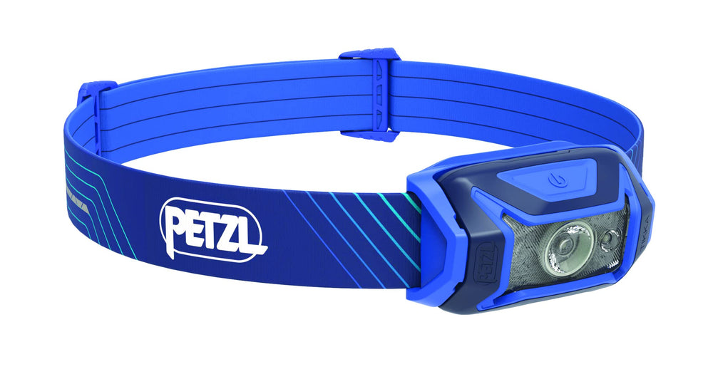 Petzl TIKKA CORE headlamp front view shows compact rechargeable design for hiking and camping.