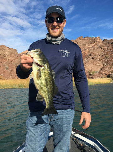 Pflueger President spincast blue retrieve action showing smooth line take