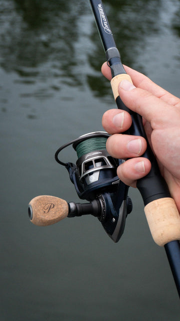Pflueger President XT 40X reel mounted on rod during use for easy casting.