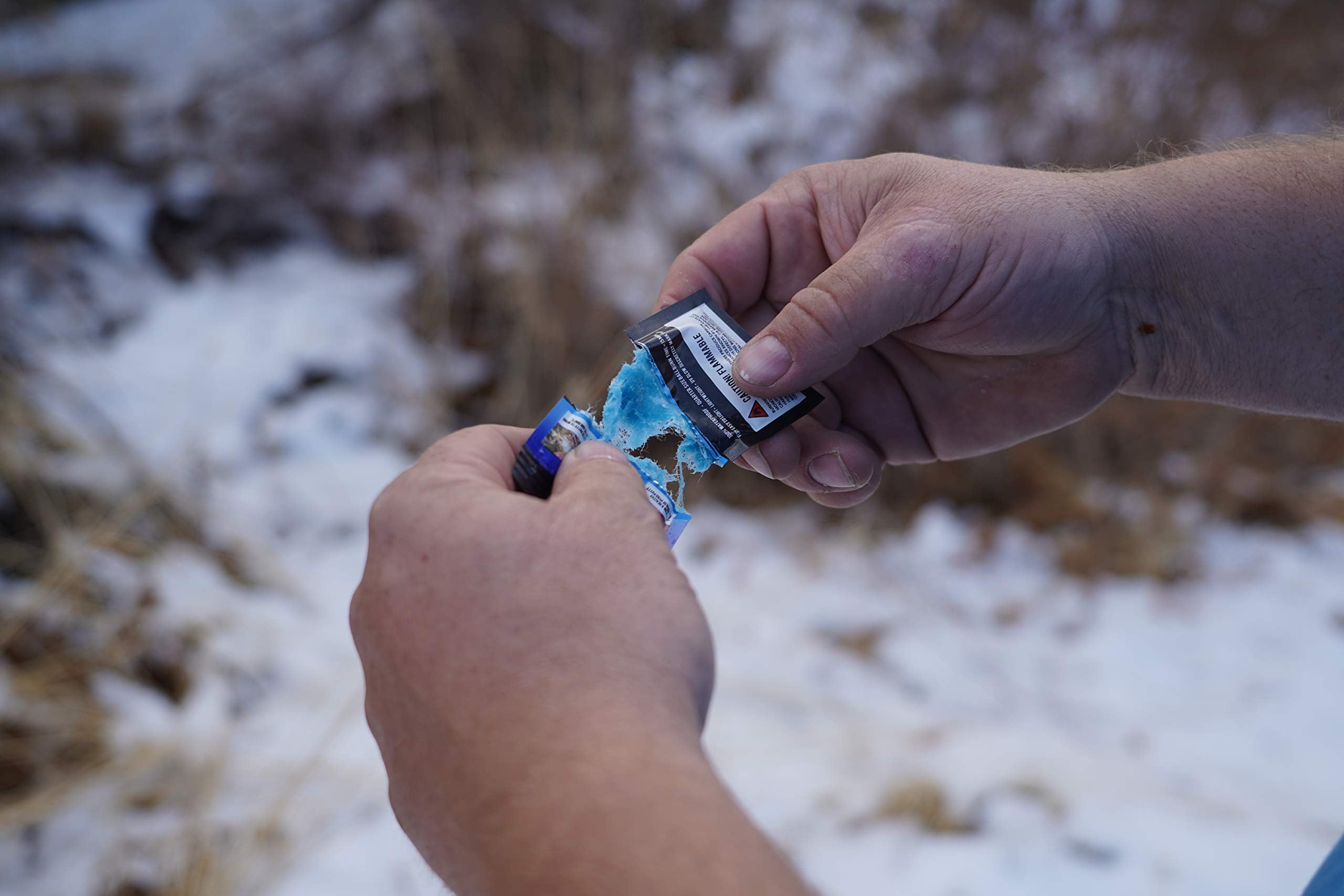 Phone Skope Pyro Putty backpacking kit shows lightweight fire starting.