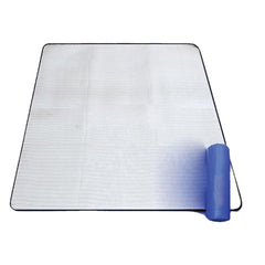 Pilipane camping mat with foil blanket on damp grass stays dry