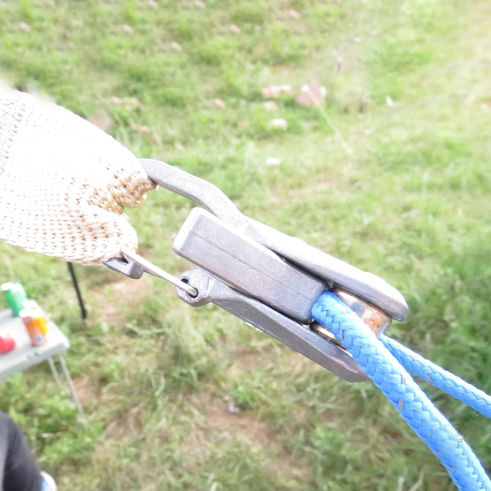 Pinenalo boating tie-down securing gear with locking buckle engaged