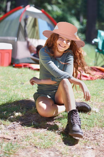 Outdoor activities with pink kid sun hat