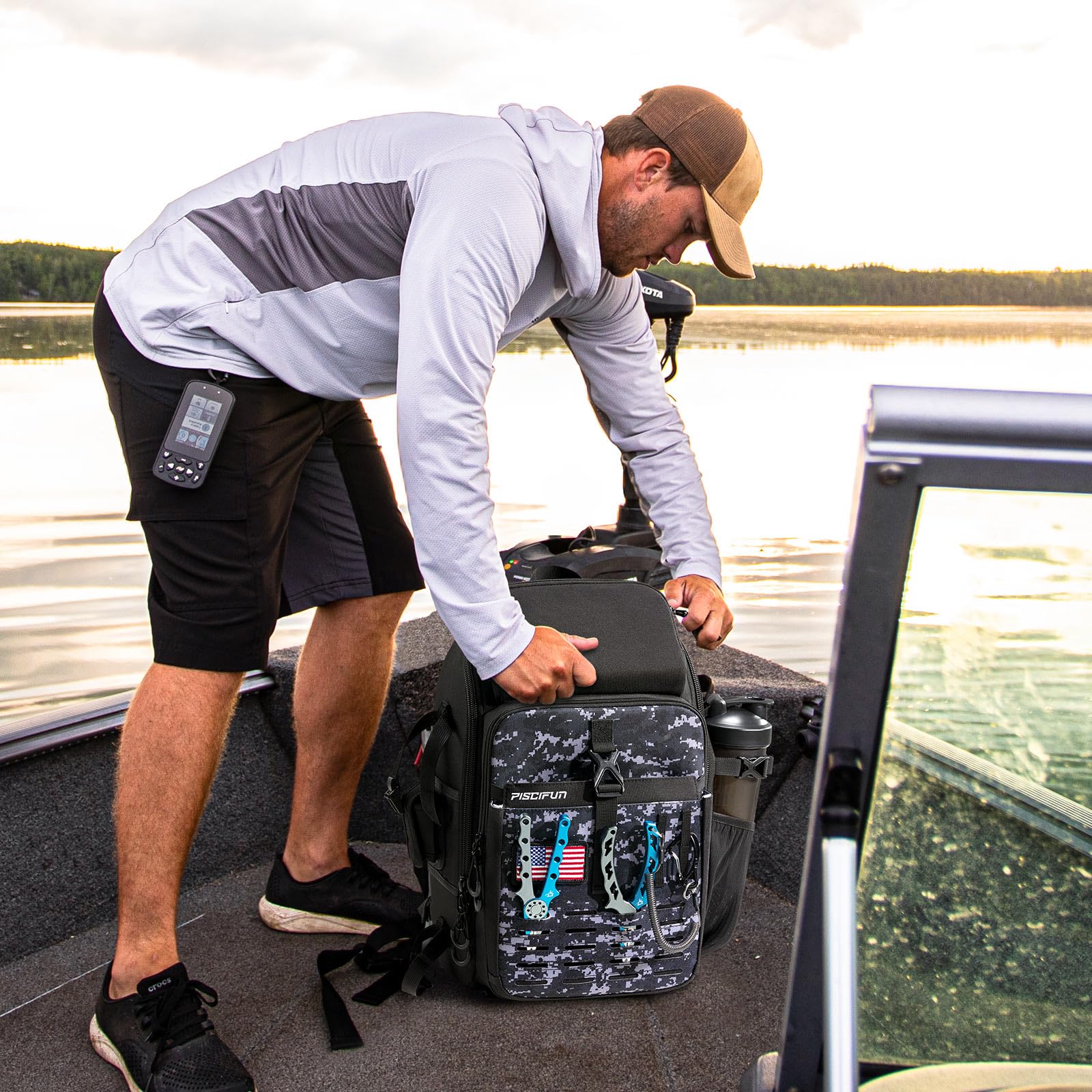 Piscifun fishing tackle backpack side view with rod holder for secure transport.