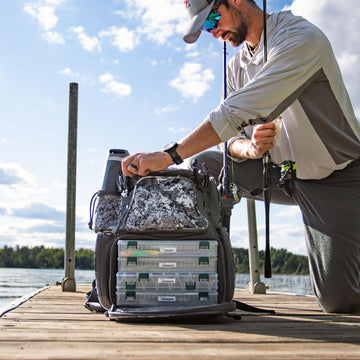 Backpack main compartment with removable clapboard showing 45L capacity