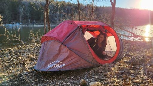 Pittman Outdoors PPI-POPUP2X red tent offers high visibility outdoors.