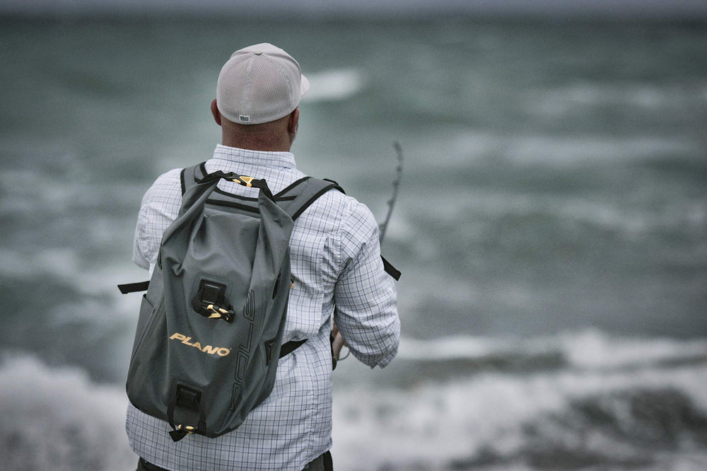 Plano Z-Series roll-top waterproof backpack welded seams protect gear in rain.