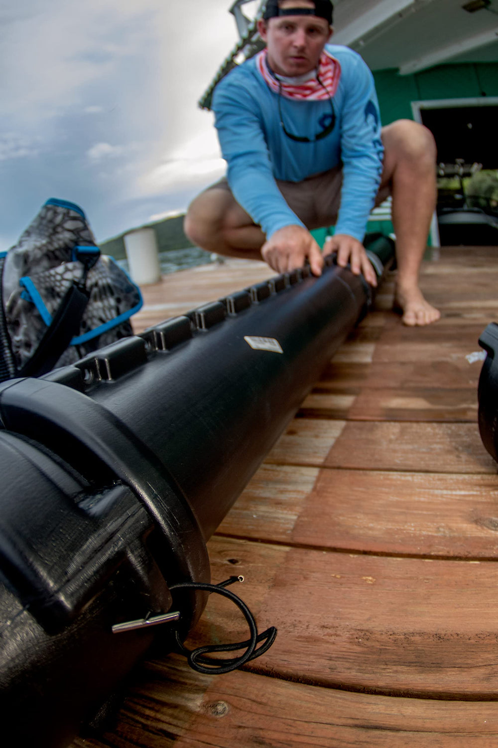 Extended 112-inch length of Plano rod case showing capacity