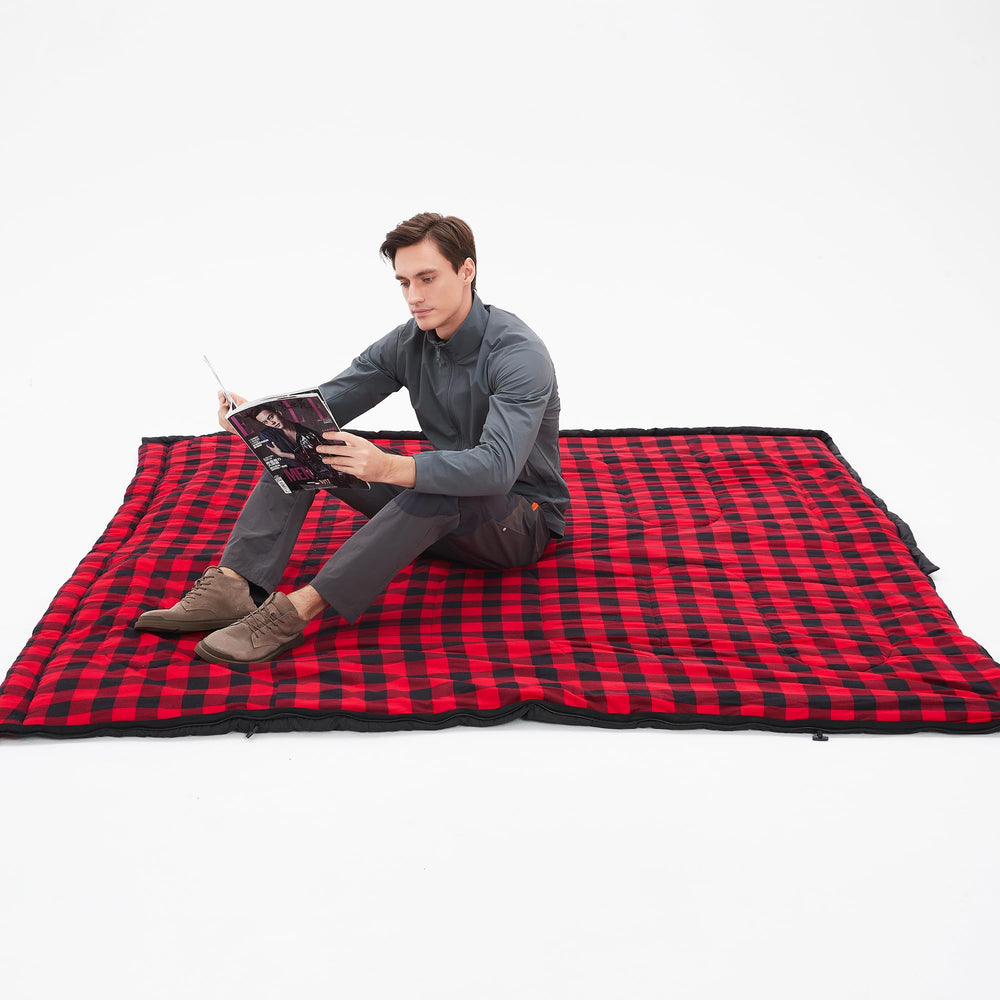 PO PO BEAR black sleeping bag ready for outdoor comfort in cooler weather.