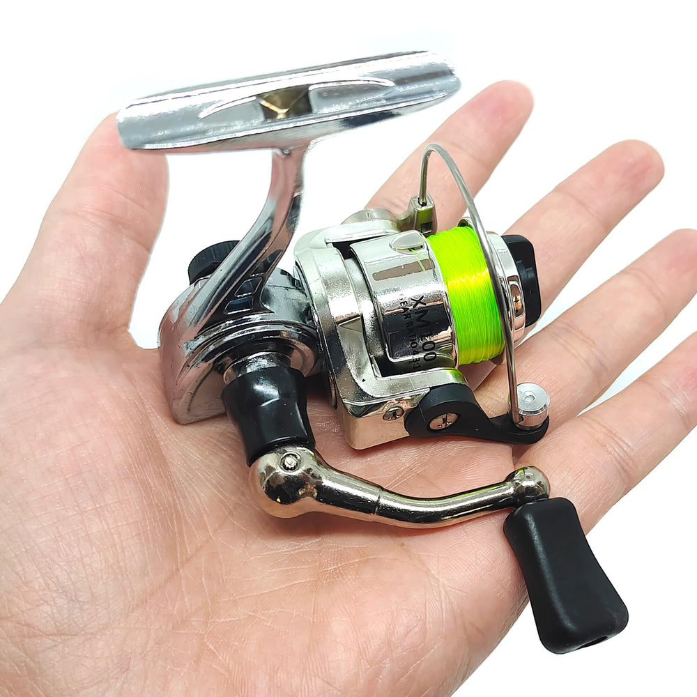 Pocket-sized fishing rod held in hand