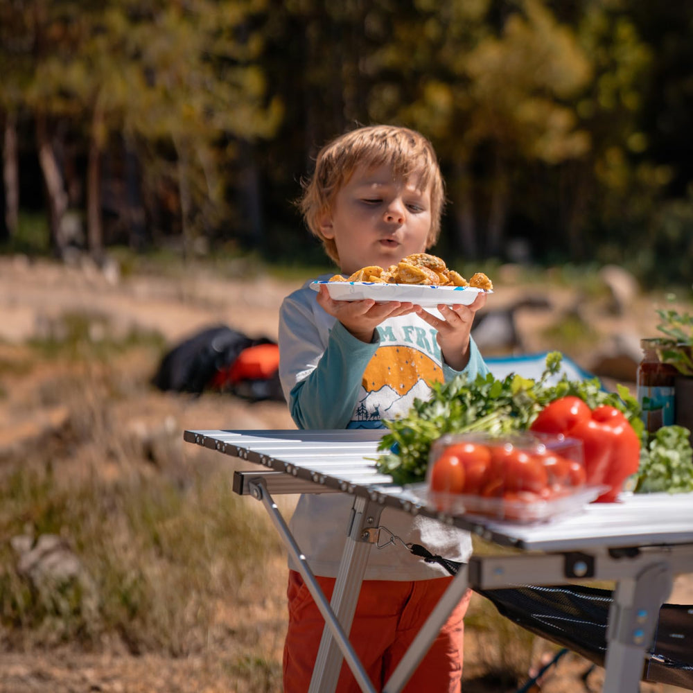 Portal adjustable legs extended to a comfortable height on uneven ground.