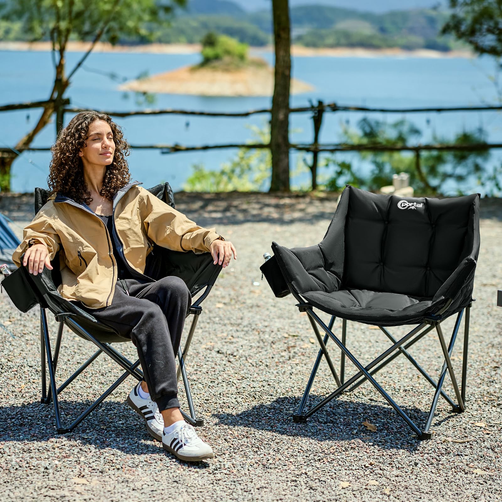 Portal oversized padded camping chair with cup holder and side pocket shows convenient storage and drinks within reach.