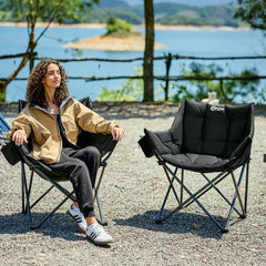 Portal oversized padded camping chair with cup holder and side pocket shows convenient storage and drinks within reach.