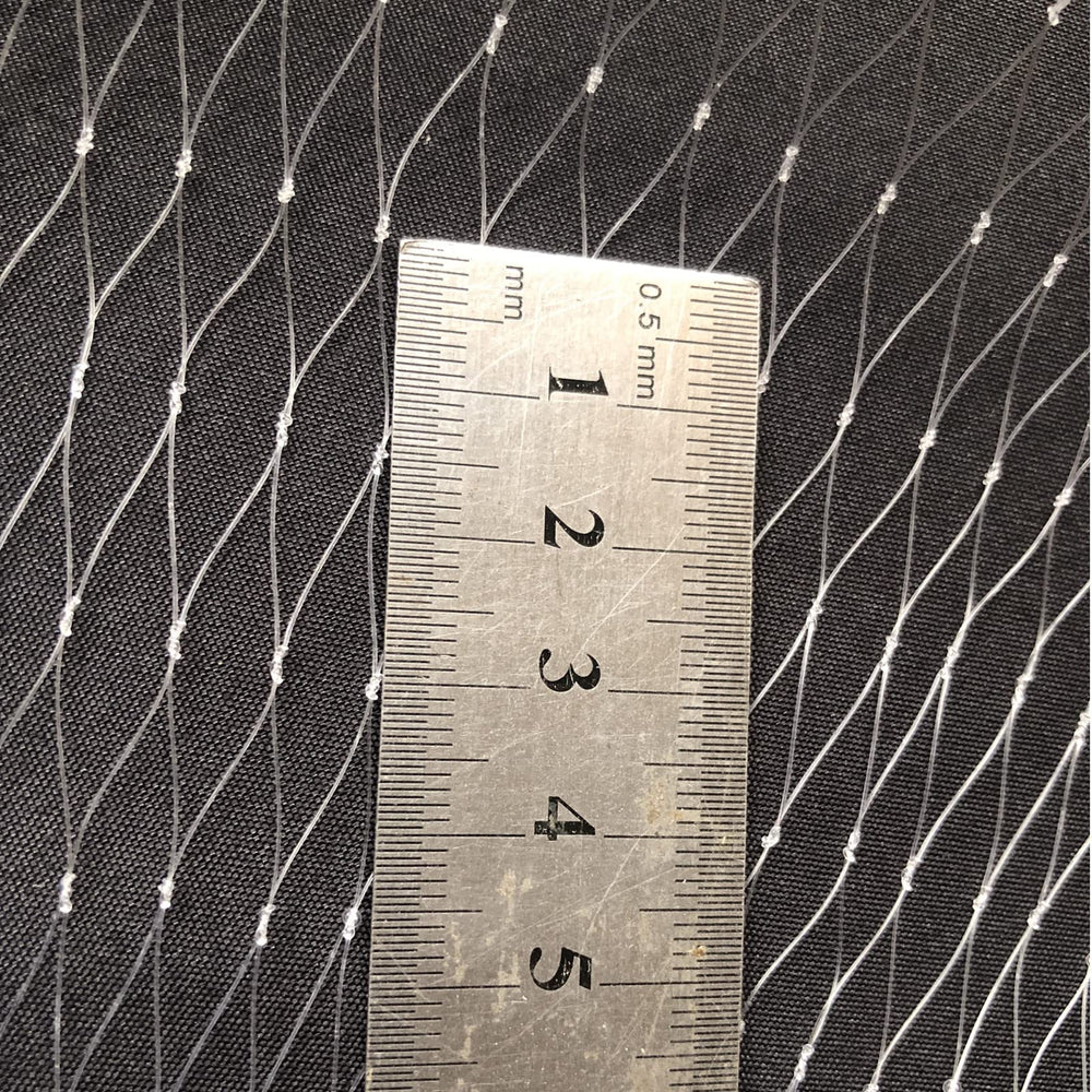 POUI COME DREAM 15mm mesh close-up highlighting even spacing for small fish capture.