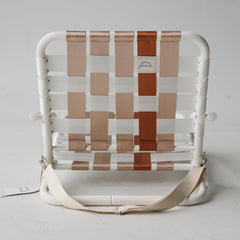 Praia Beach Chair adjustable carrying strap enables hands-free transport.