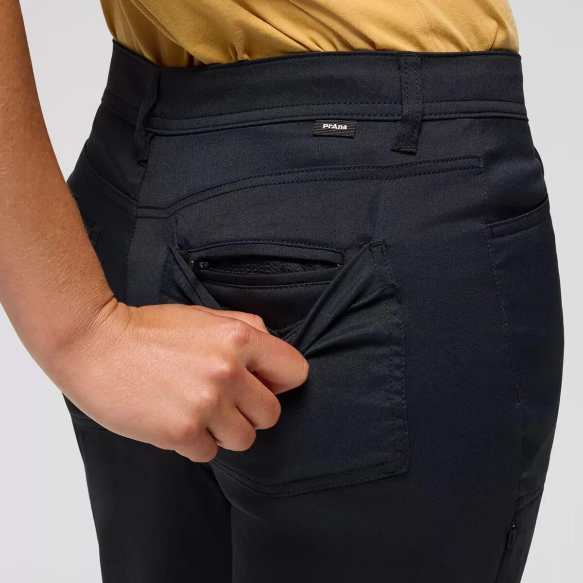 Side zipper security pocket keeps valuables safe while moving.