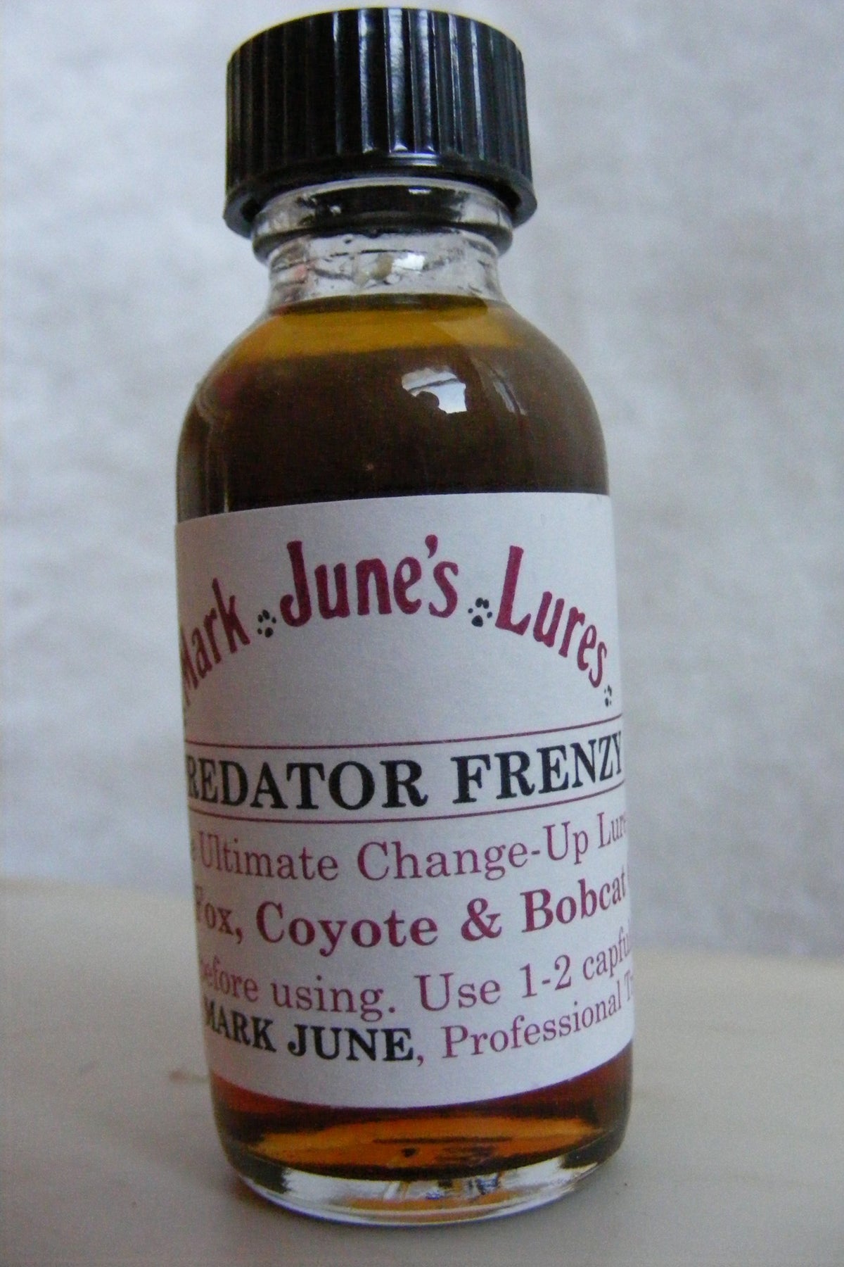 Predator Frenzy Lure bottle showing the change-up scent for attracting foxes, coyotes, and bobcats