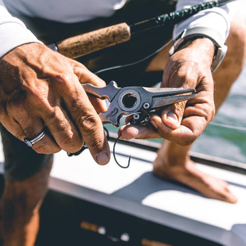 Premio pliers with leather sheath and lanyard in sheath