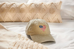 Primitives by Kathy cap with adjustable buckle for a comfortable fit