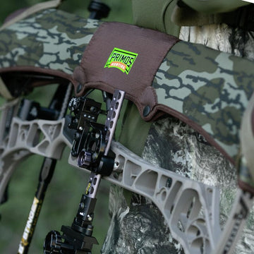 Primos bow sling in Mossy Oak Bottomland camo enhancing field concealment