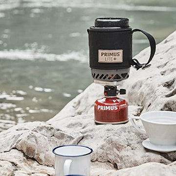 PRIMOS self-sealing valve close-up demonstrates safe fuel handling outdoors.