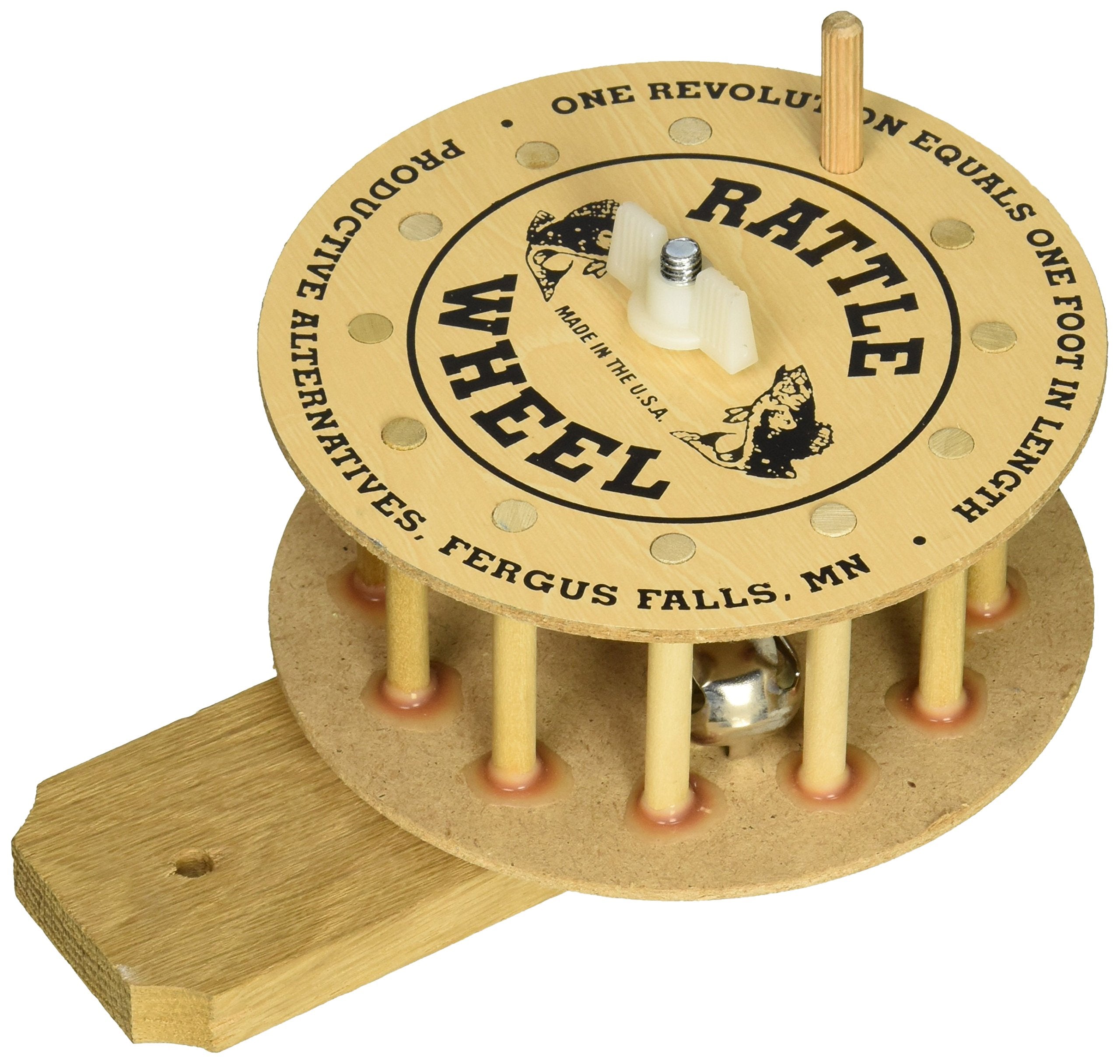 Productive 101 Rattle Reel Wall Mount on a cabin wall for easy ice fishing reel access.
