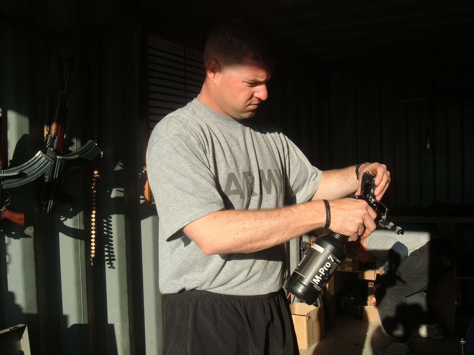 Prom Pro7 gun cleaner bottle close-up: odorless and non-toxic