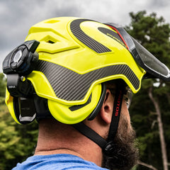 Side view of the Protos helmet showing integrated hearing protection for safer climbing.