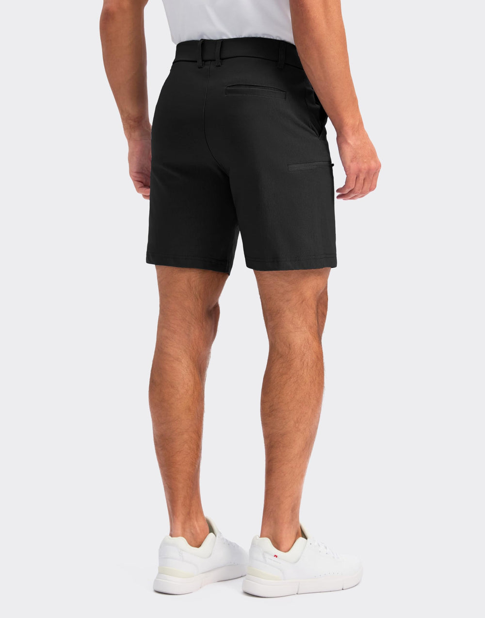 Pudolla golf shorts stretch fabric close-up highlighting flexible movement during play.