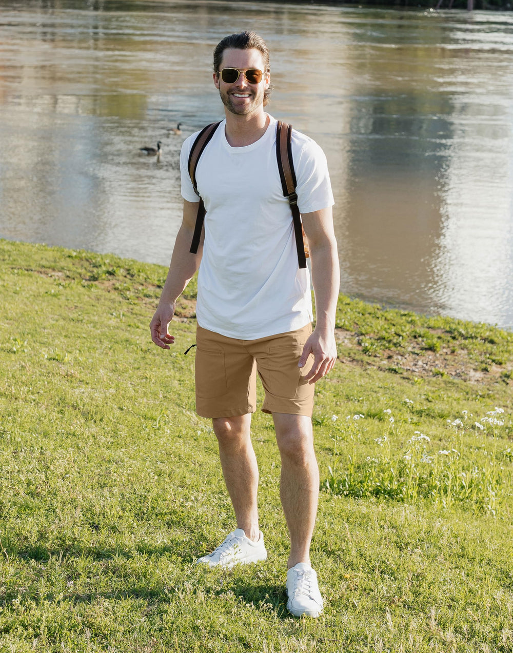Pudolla men's hiking cargo shorts 9-inch dark khaki back pocket secure storage during outdoor adventures.