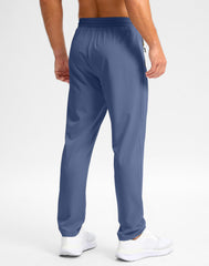 Pudolla sweat pants haze blue back-view showing baggy silhouette and versatile style.