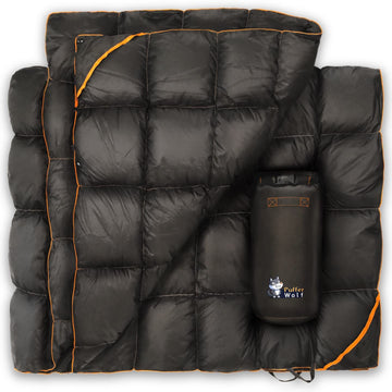 Puffer Wolf packable blanket in a stuff sack for easy travel.