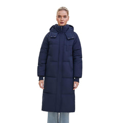 PUFFIT long puffer jacket worn by a model outdoors for reliable winter warmth