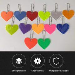 PUZOU fluorescent yellow reflector pendant for daytime-to-night visibility.