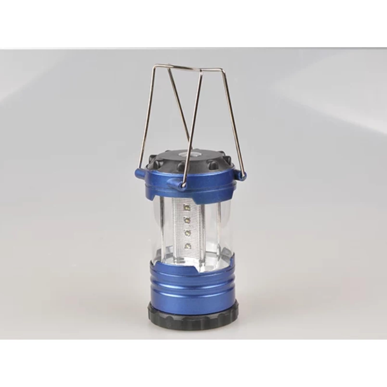 QANYEGN battery-powered lantern with bottom compartment design.