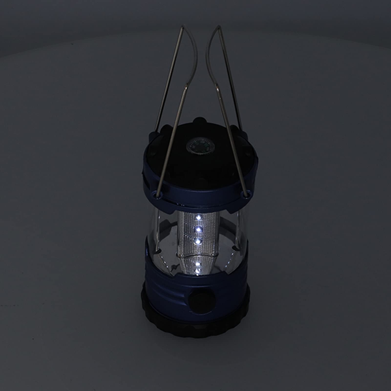 QANYEGN outdoor lantern suited for camping, hiking, and fishing.