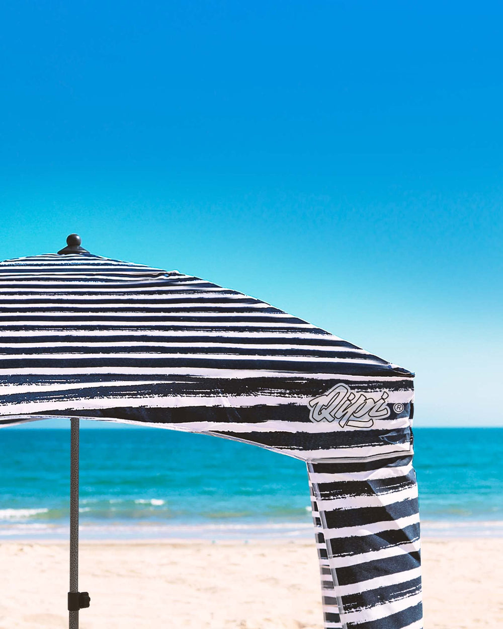 Qipi Beach Cabana removable side wall adds adjustable sun protection