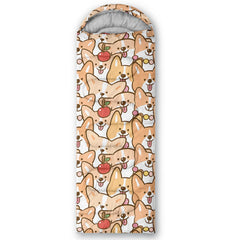 QOOMO corgi-printed sleeping bag packaged in cylinder demonstrates easy travel portability