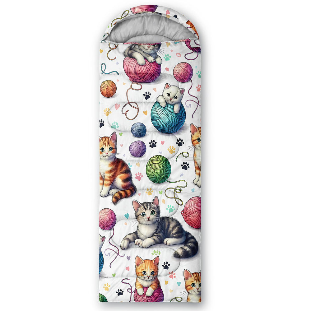 QOOMO Kawaii Cat sleeping bag packable design demonstrates compact carry for trips and storage.