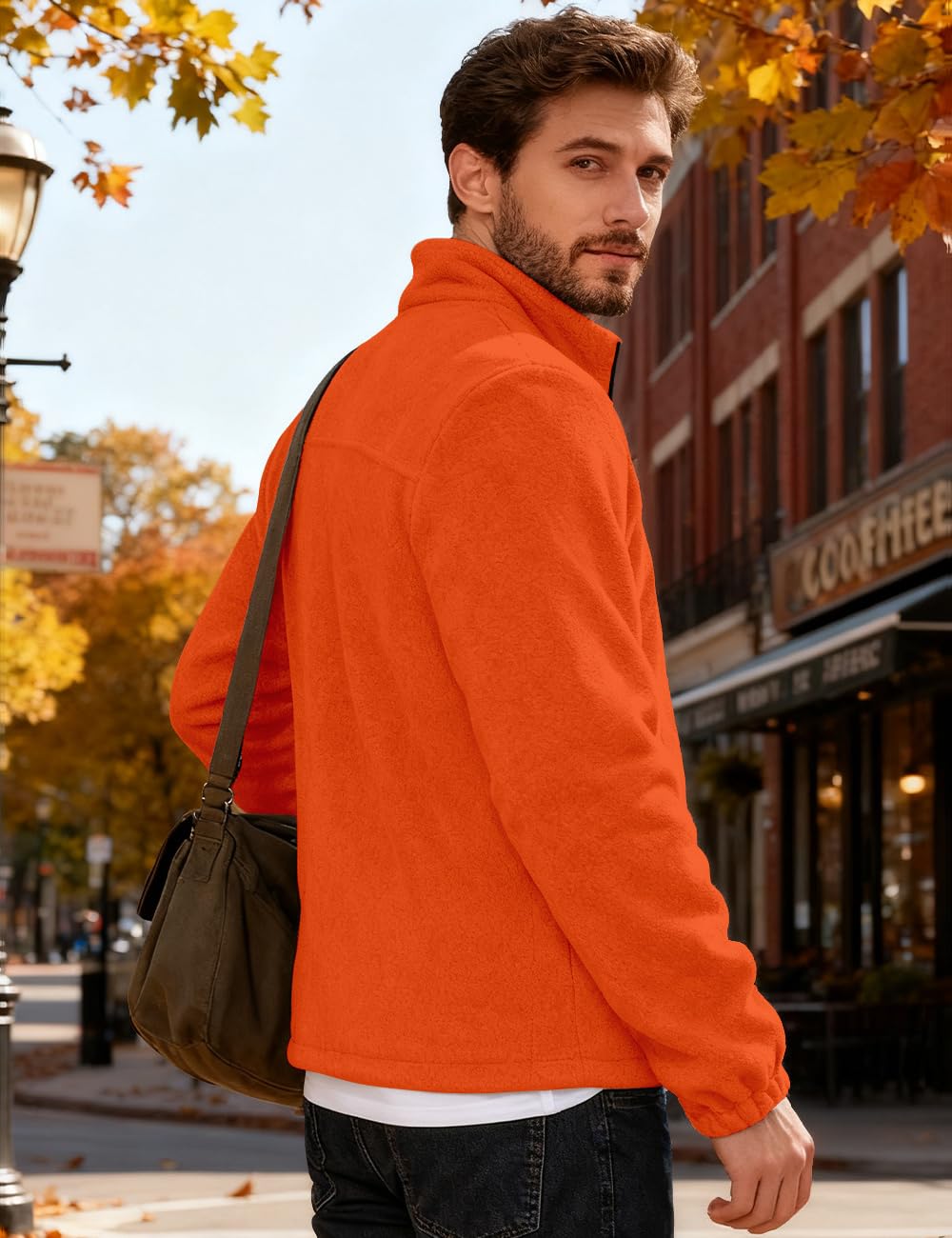 QOSOQ outdoor jacket demonstrates windproof versatility for outdoor activities