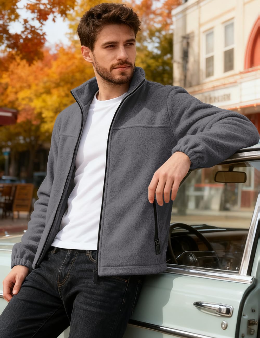 QOSOQ fleece jacket with pockets for secure storage during outdoor activities.