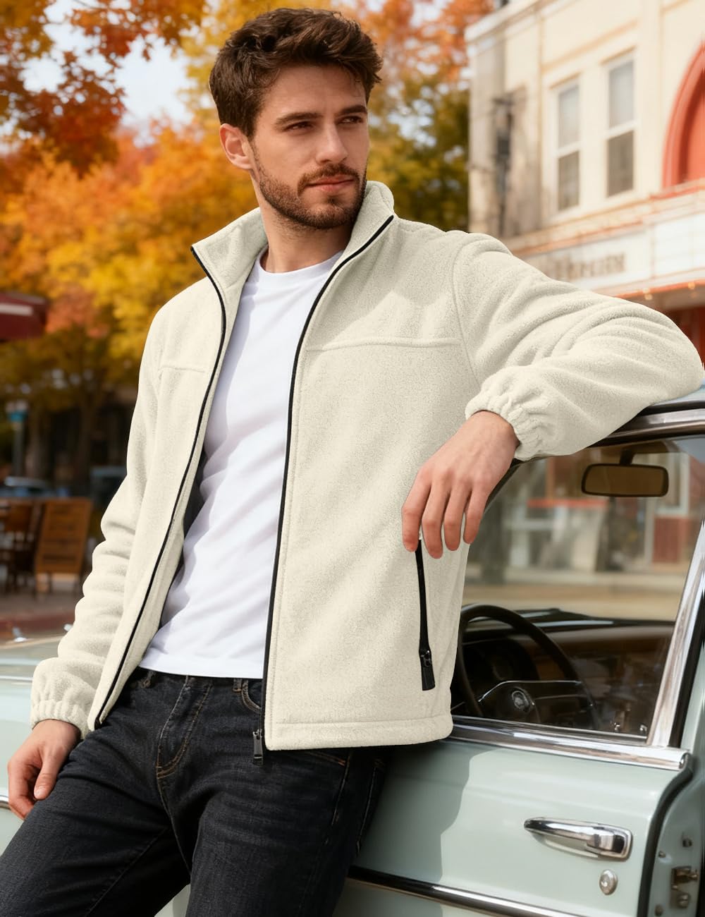 QOSOQ men's polar fleece jacket zip pockets keep essentials secure.