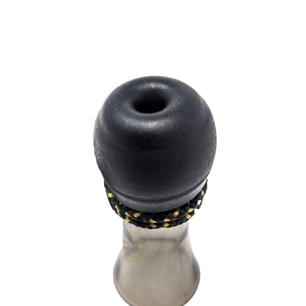 Close-up of Quaker Boy Weezzy Snort Weeze Deer Call Smoke showing plastic construction