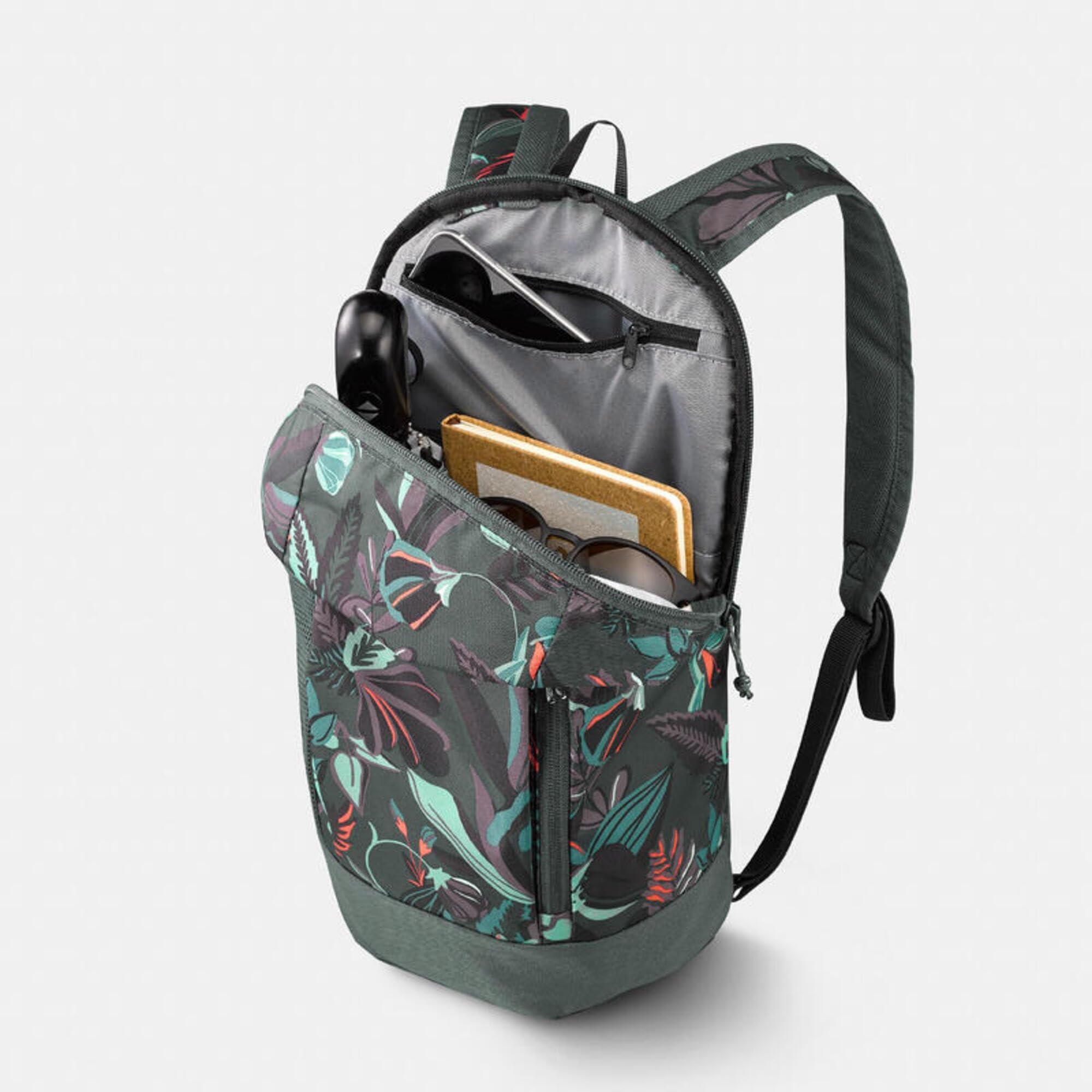 Quechua NH100 mesh side pocket holds a 1L water bottle