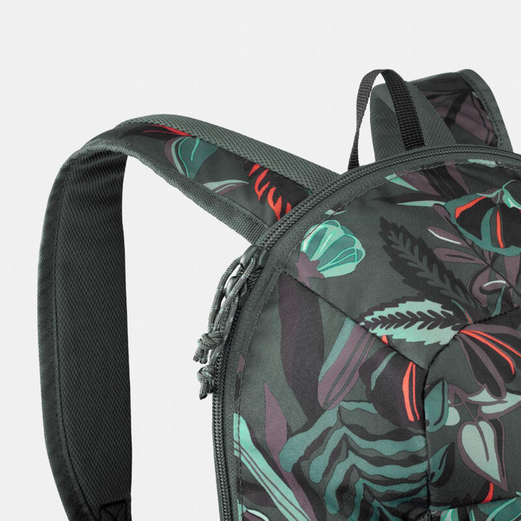 Quechua NH100 on trail, compact daypack ready for adventures