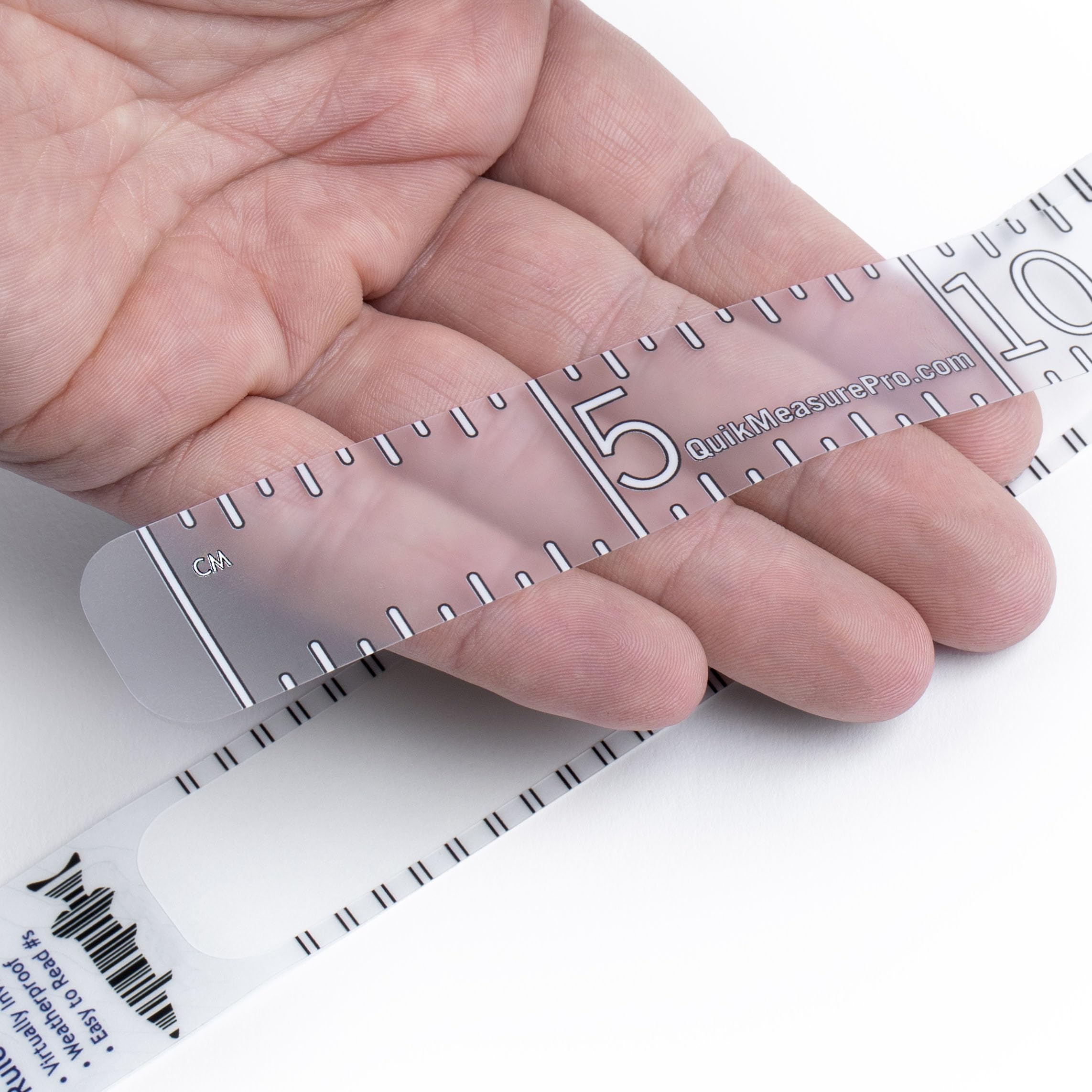 Quik Measure Pro fish ruler 100cm decal with clear metric marks on a boat.