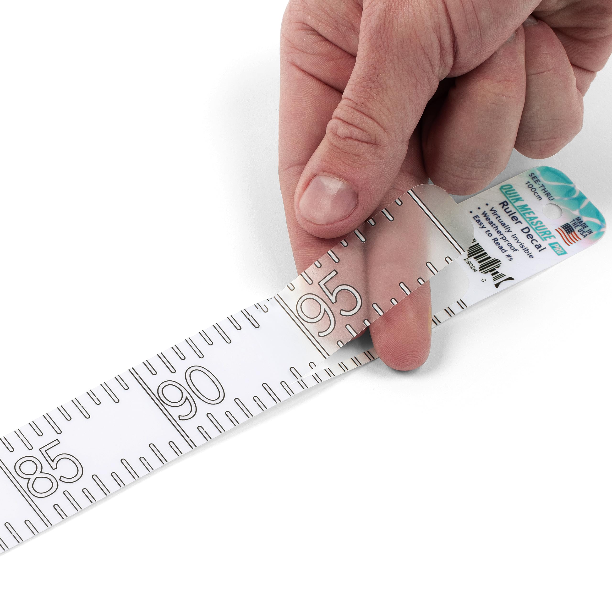 Quik Measure Pro transparent metric ruler decal showing discreet measurement on kayak deck.