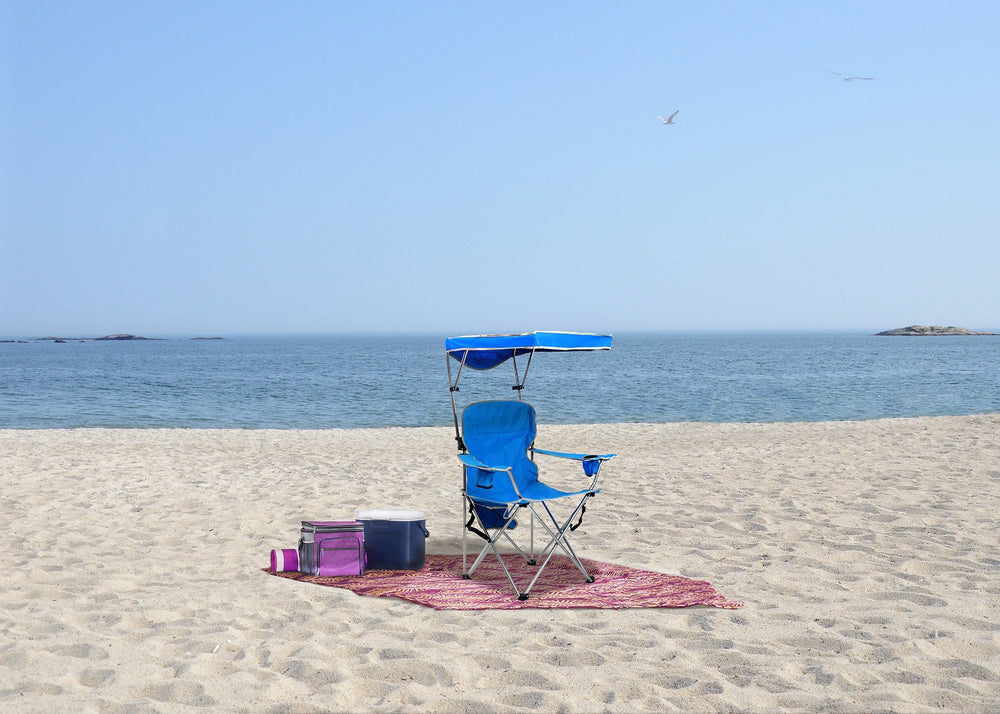 Quik Shade full size shade chair at the beach with canopy raised