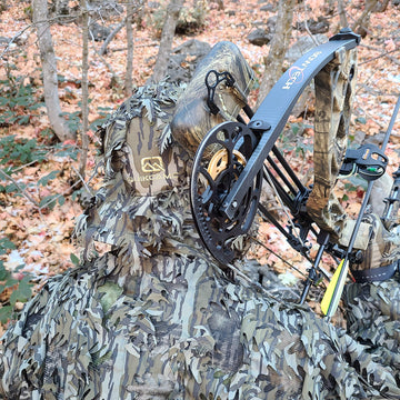 QuikCamo Mossy Oak Break-Up adjustable hat strap for a secure fit.
